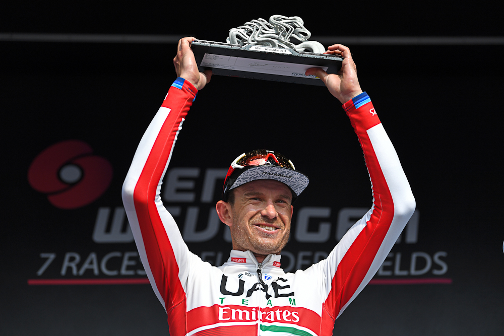 Alexander Kristoff hoists the 2019 Gent-Wevelgem trophy