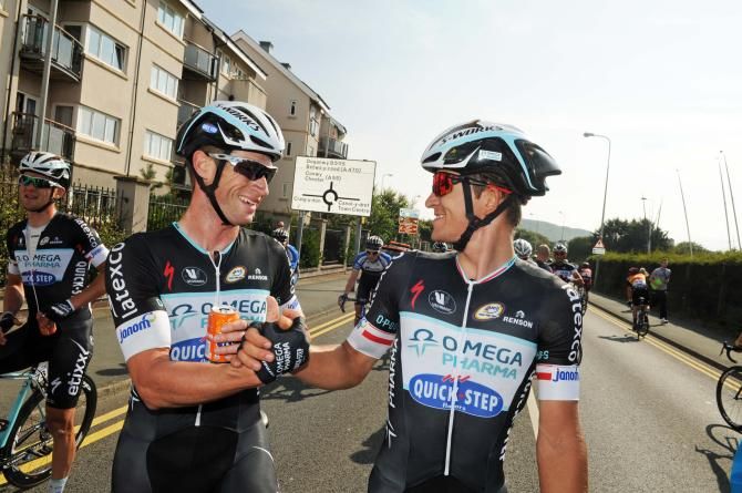 Mark Renshaw (OPQS) with team mate after win