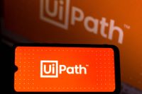 UiPath logo displayed in white lettering on a red background on smartphone screen.
