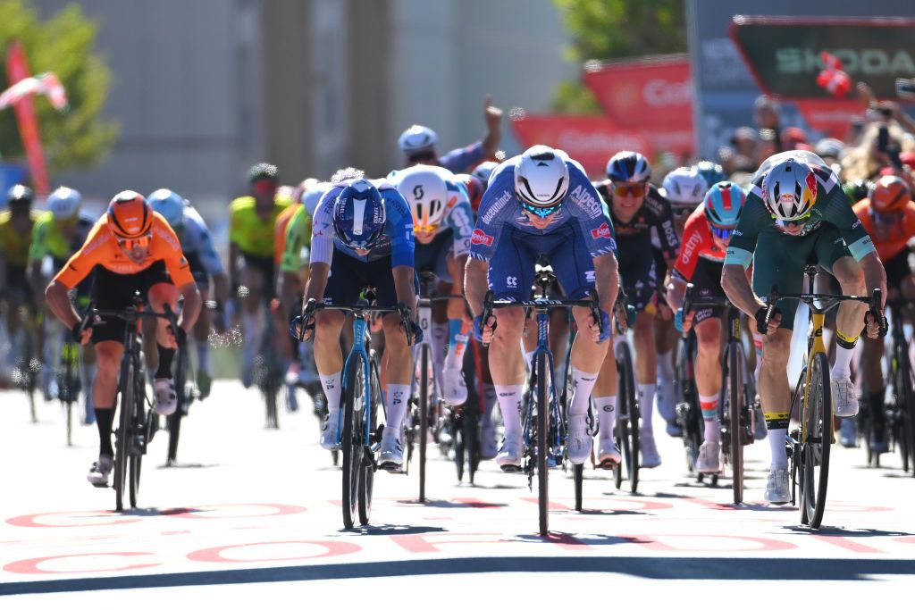 OUREM PORTUGAL AUGUST 18 LR Corbin Strong of New Zealand and Team Israel Premier Tech stage winner Kaden Groves of Australia and Team Alpecin Deceuninck and Wout van Aert of Belgium and Team Visma Lease a Bike Green Points Jersey sprint at finish line during the 79th La Vuelta Ciclista a Espana 2024 Stage 2 a 194km stage from Cascais to Ourem UCIWT on August 18 2024 in Ourem Portugal Photo by Tim de WaeleGetty Images