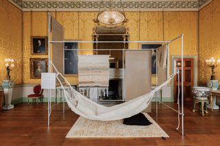 Room at Harewood house with hammock by Ilse Crawford