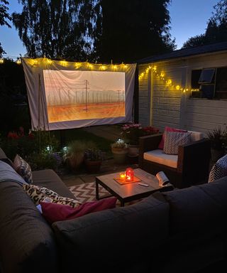 outdoor cinema setup in a garden