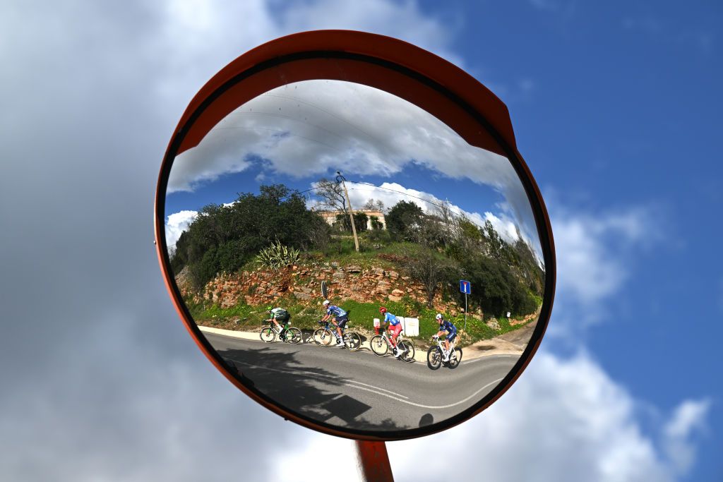 FARO PORTUGAL FEBRUARY 22 Mirror view of Gorka Sorarrain of Spain and Team Caja Rural Seguros RGA Warre Vangheluwe of Belgium and Team Soudal QuickStep German Nicolas Tivani of Argentina and Team Aviludo Louletano Loul Blue Mountain Jersey and Johan Jacobs of Switzerland and Team Groupama FDJ in the breakaway during the 51st Volta ao Algarve em Bicicleta Stage 4 a 1752km stage from Albufeira to Faro on February 22 2025 in Faro Portugal Photo by Tim de WaeleGetty Images