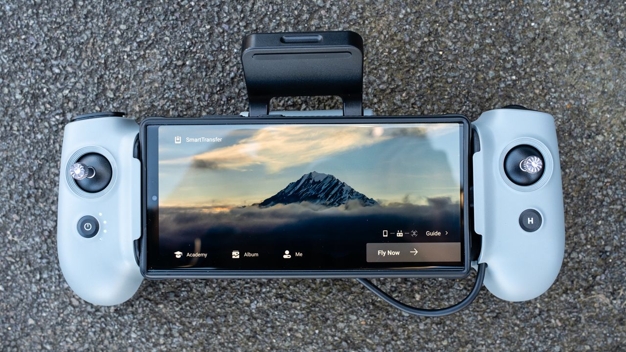 Potensic Atom 2 drone controller with smartphone attached