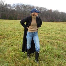 Sara Walker in a Ralph Lauren cable knit and Hunter boots