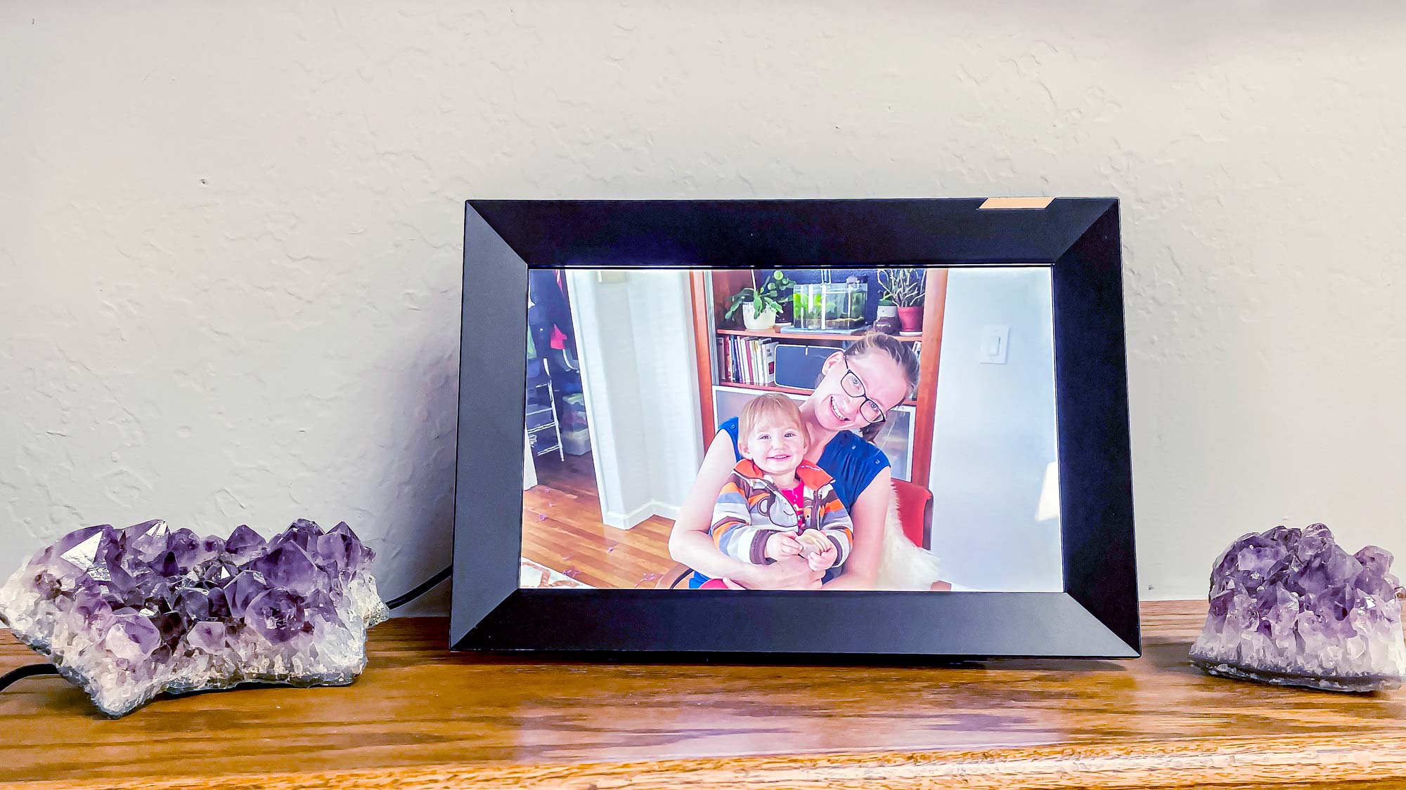 Nixplay Smart Photo Frame 10.1 inch Touch sitting on mantle