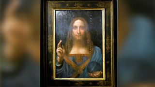 Leonardo da Vinci's 'Salvator Mundi' painting, shown here after being unveiled in Hong Kong on Oct. 13, 2017, has a dramatic past.