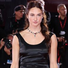 Shailene Woodley attended the 2025 Venice Film Festival in a satin little black dress from Kallmeyer