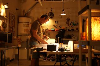 Darrell Miklos works in his studio, from Discovery's new eight-part documentary series, "Cooper's Treasure."
