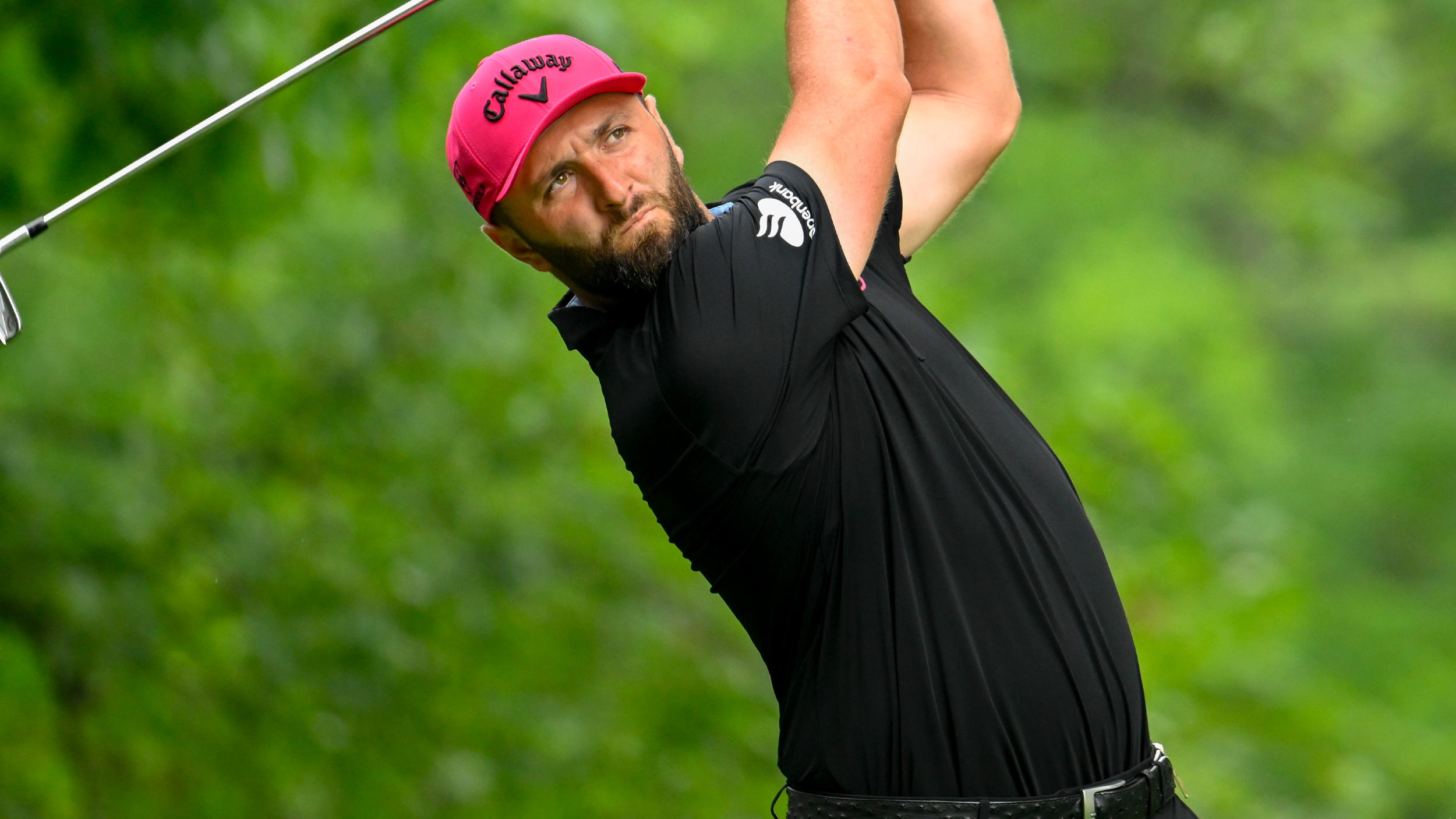 Jon Rahm takes a shot