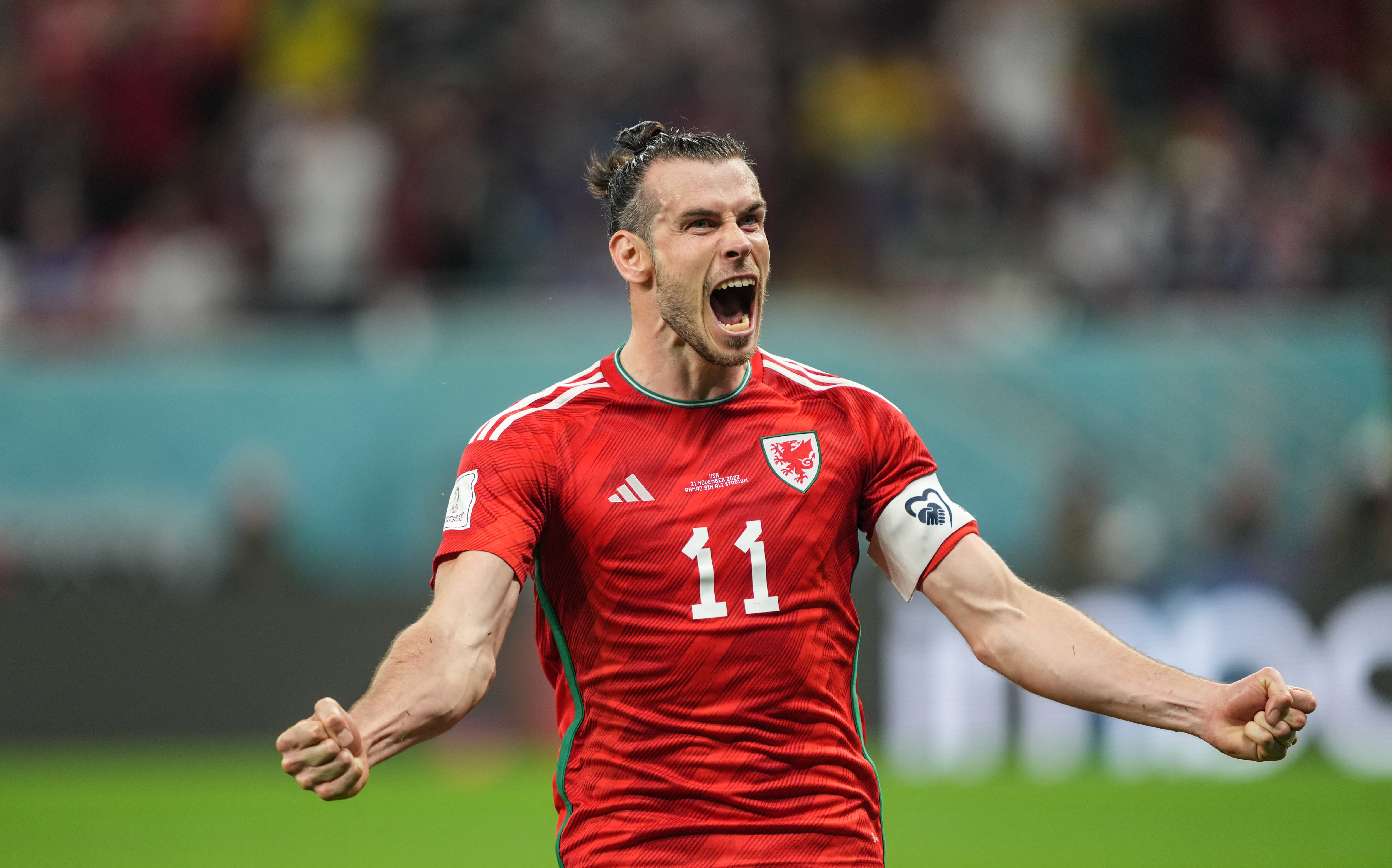 Gareth Bale celebrates after scoring for Wales at the 2022 World Cup.