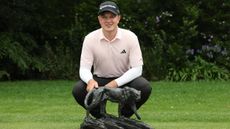 Jayden Schaper with the Alfred Dunhill Championship trophy 