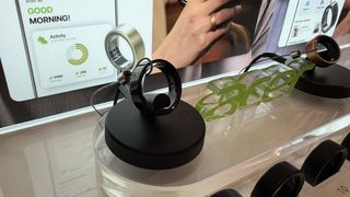 Acer FreeSense Ring next to acer logo plaque on stand