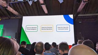 Google Mandiant Duet AI product names on a screen at Google Cloud Next London 2023.