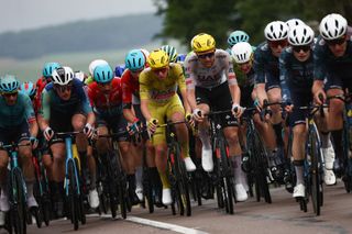 Yellow jersey Tadej Pogačar (UAE Team Emirates) in the peloton