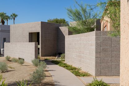 Arizona home by Benjamin Hall, a cubist sculptural and minimalist concrete masonry brick home