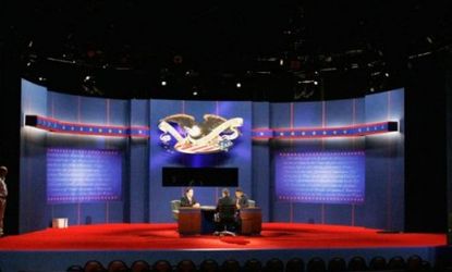 Students playing the parts of President Obama, Mitt Romney, and moderator Bob Schieffer rehearse on the set of the final debate in Boca Raton, Fla