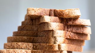 Stack of sliced brown bread