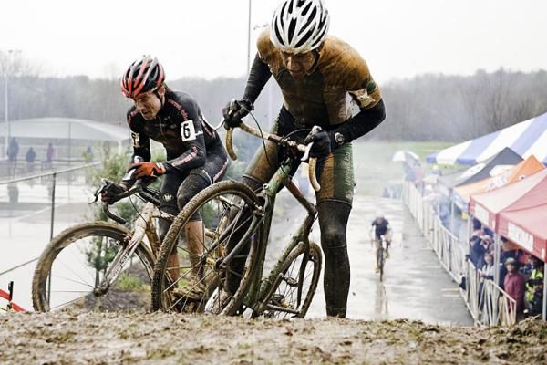 James Lalonde (Planet Bike), left, tries to avoid getting tangled up with Eric Thompson (Lees-McRae College) atop the "wall".
