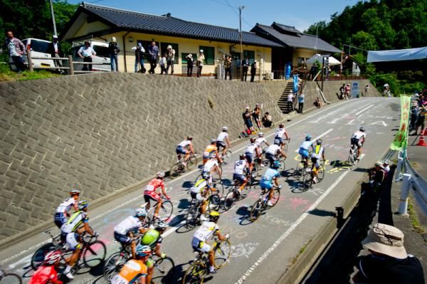 Riders pass the painted road