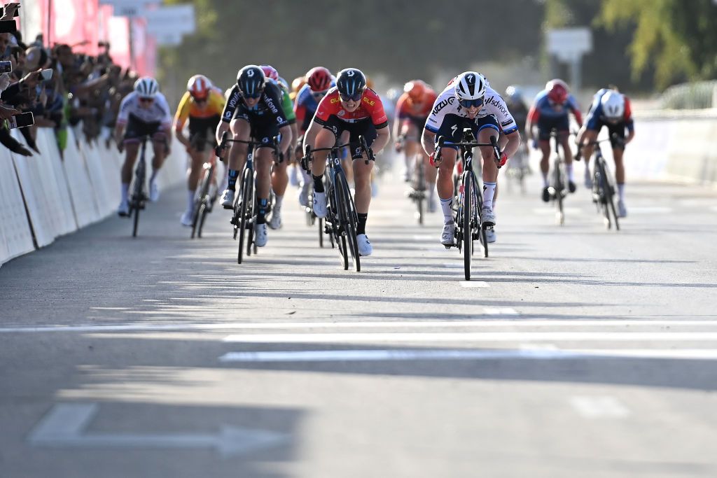 AL MIRFAUNITED ARAB EMIRATES FEBRUARY 10 LR Charlotte Kool of The Netherlands and Team DSM Red Leader Jersey and Lorena Wiebes of The Netherlands and Team SD Worx sprint at finish line during the 1st UAE Tour Women 2023 Stage 2 a 133km stage from Al Dhafra Castle to Al Mirfa UAETourWomen on February 10 2023 in Al Mirfa United Arab Emirates Photo by Tim de WaeleGetty Images