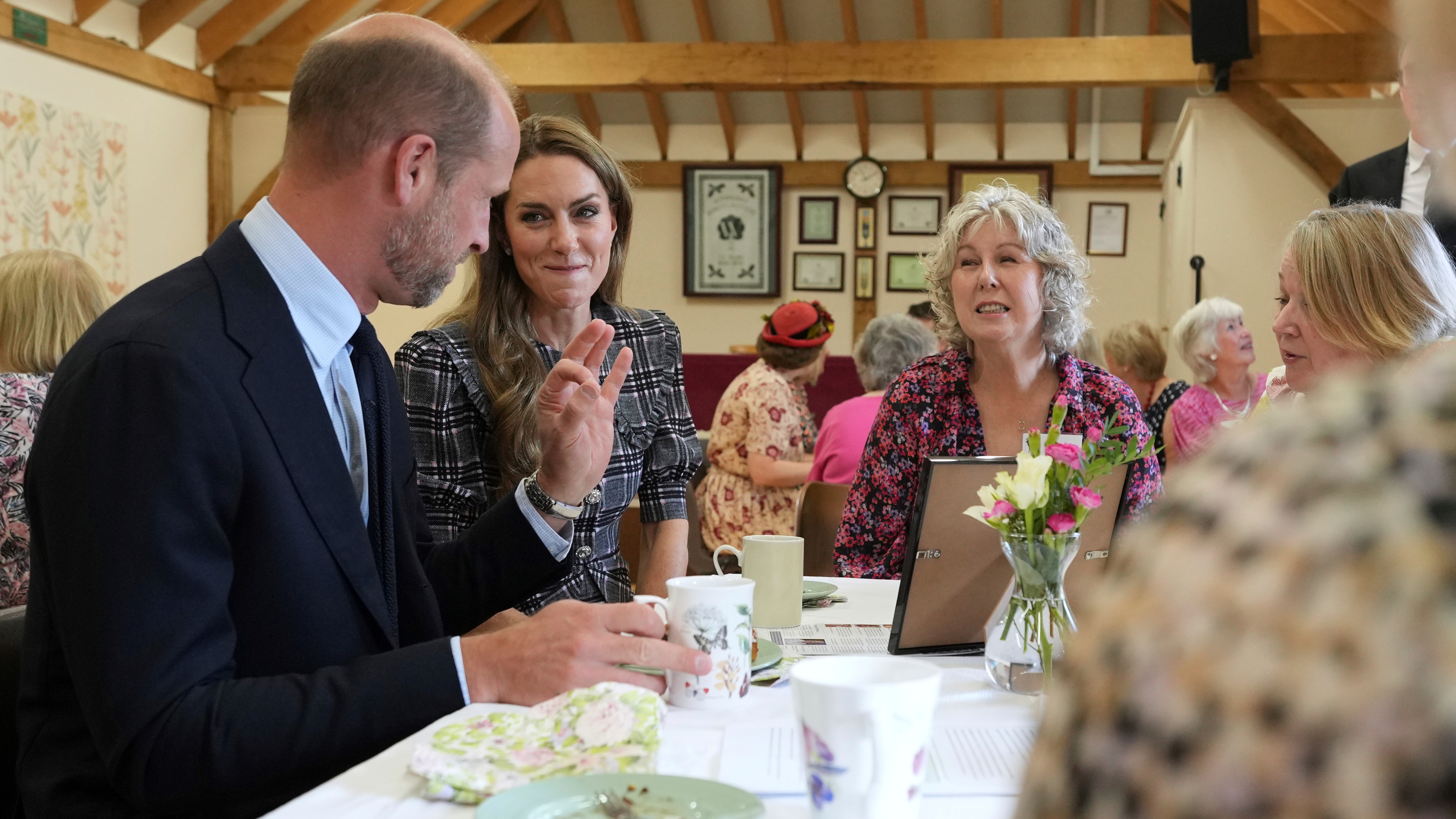 Catherine, Princess of Wales and Prince William, Prince of Wales speak to members as they visit the National Federation of Women&#039;s Institute (WI) to commemorate the three-year anniversary of the death of Queen Elizabeth II on September 8, 2025