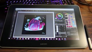 Wacom One tablet being used to illustrate digitally.
