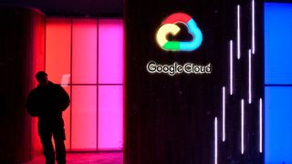 A man guards the entrance of the Google Cloud booth of the World Economic Forum (WEF) 2018 annual meeting on January 21, 2018 in Davos, eastern Switzerland. 