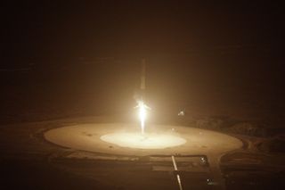 The first stage of SpaceX's Falcon 9 rocket is seen just before touching down on Landing Site 1 at Florida's Cape Canaveral Air Force Station on Dec. 21, 2015.
