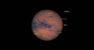 Starry Night can magnify your view of the planet to simulate a telescopic view, and display the names of the visible markings on Mars' globe. This view is right-way-up, but the software allows you to flip the planet to match your optics.
