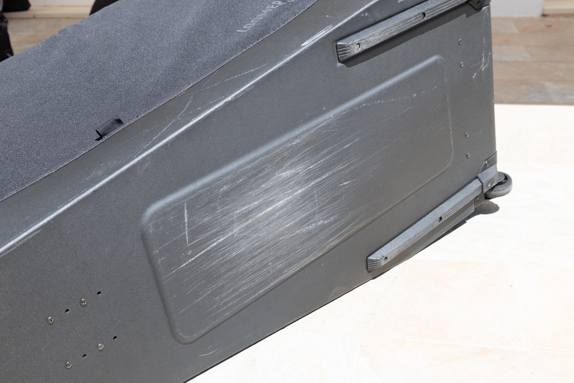 scrape marks on the underside of the bag'