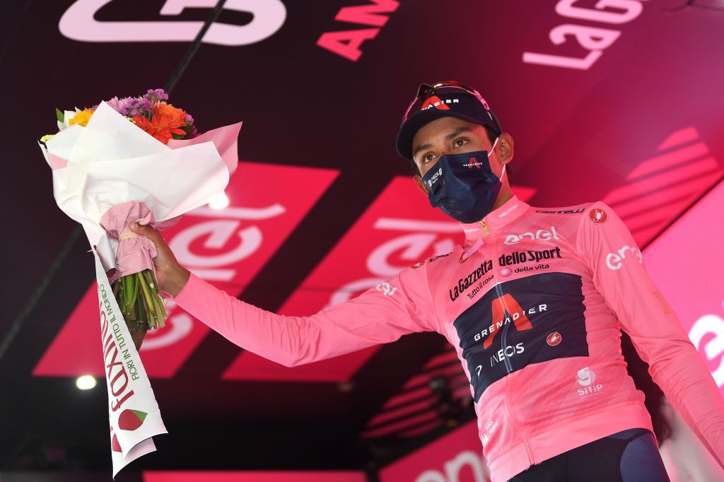 VERONA ITALY MAY 21 Egan Arley Bernal Gomez of Colombia and Team INEOS Grenadiers Pink Leader Jersey celebrates at podium during the 104th Giro dItalia 2021 Stage 13 a 198km stage from Ravenna to Verona girodiitalia Giro UCIworldtour on May 21 2021 in Verona Italy Photo by Tim de WaeleGetty Images