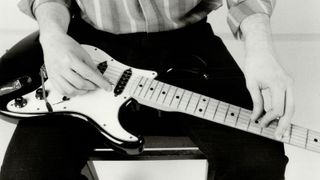 Jeff Healey plays a Stratocaster style guitar on his lap. Caption: Jeff Healey has tried conventional guitar playing. But it was too hard to work with. "To This day; people tell me I'm doing it wrong; as if they'd stumbled on to something no one else has noticed," he says