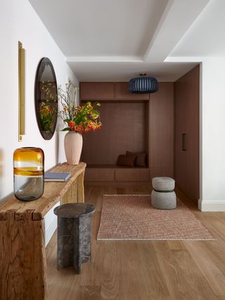 home entry hallway with built-in storage and benchseat