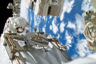 NASA astronaut Rick Mastracchio performs a spacewalk outside the International Space Station on Dec. 22, 2013, the first of two spacewalks to replace an ammonia coolant pump in one of two cooling loops on the orbiting lab.