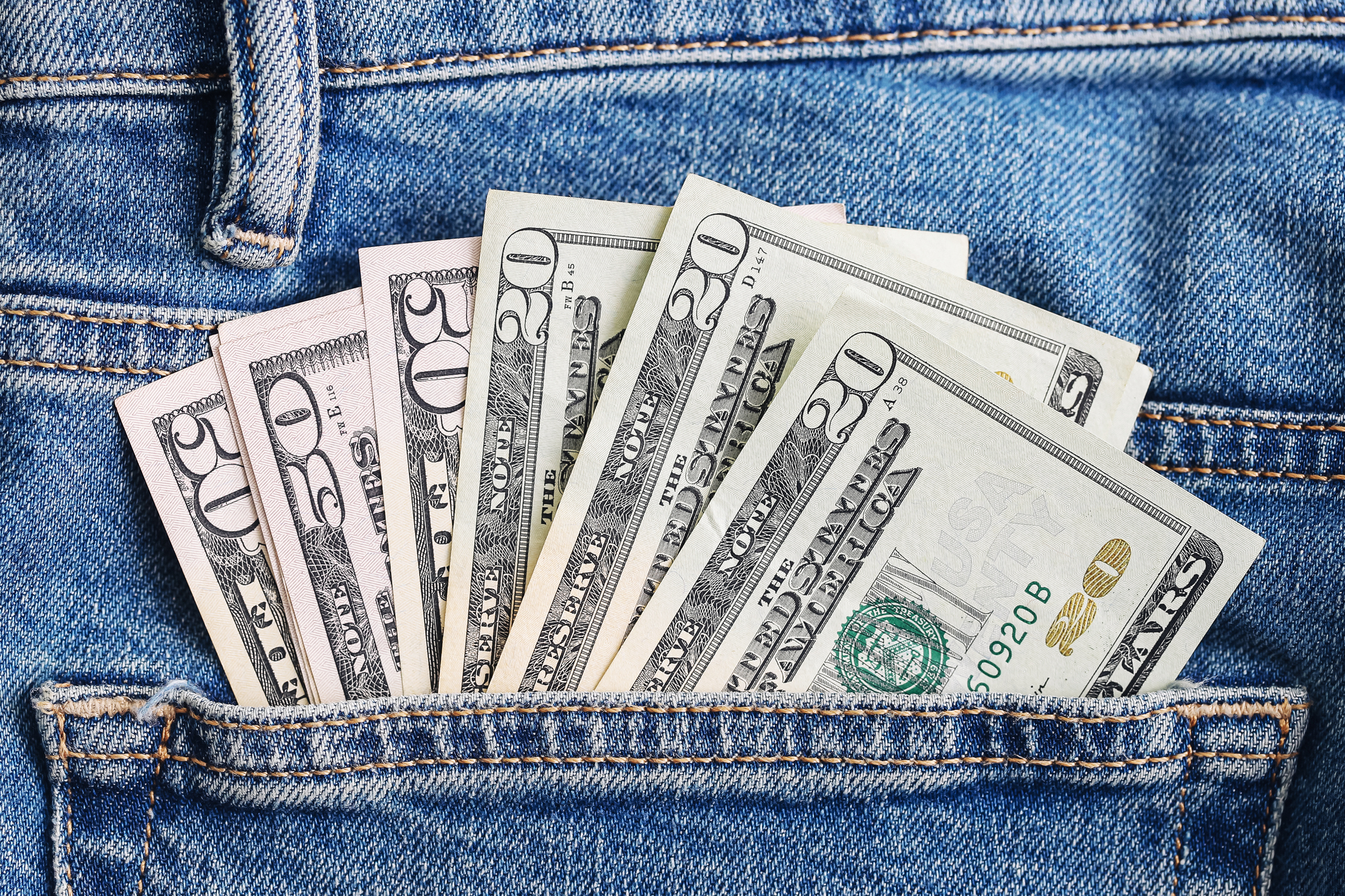 Everyday money carrying. Finance and budget lifestyle detail.