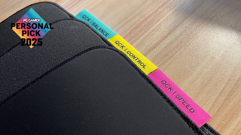 Three Steelseries QcK Performance mouse pads on a desk with a PC Gamer Personal Pick 2025 label on top