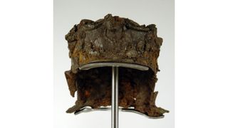 a photograph of a silver-gilt iron cavalry helmet