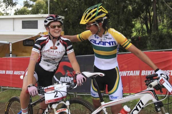 The top two women congratulate each other.