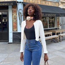 Influencer styles a pointelle cardigan.