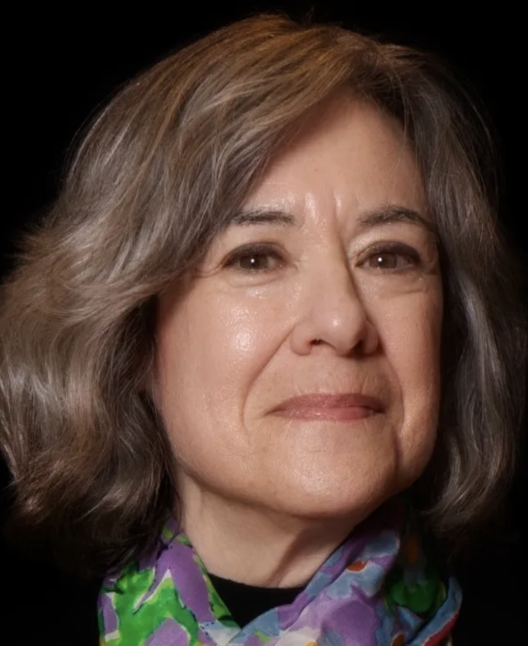 headshot of Amy Wagenfeld smiling to camera