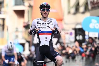 Team Bahrains Matej Mohoric of Slovenia celebrates as he crosses the finish line to win the 113th MilanSan Remo oneday classic cycling race on March 19 2022 between Milan and San Remo northern Italy Photo by Marco BERTORELLO AFP Photo by MARCO BERTORELLOAFP via Getty Images