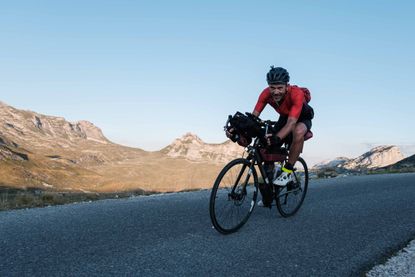 A rider descends a mountain at the 2022 Transcontinental Race