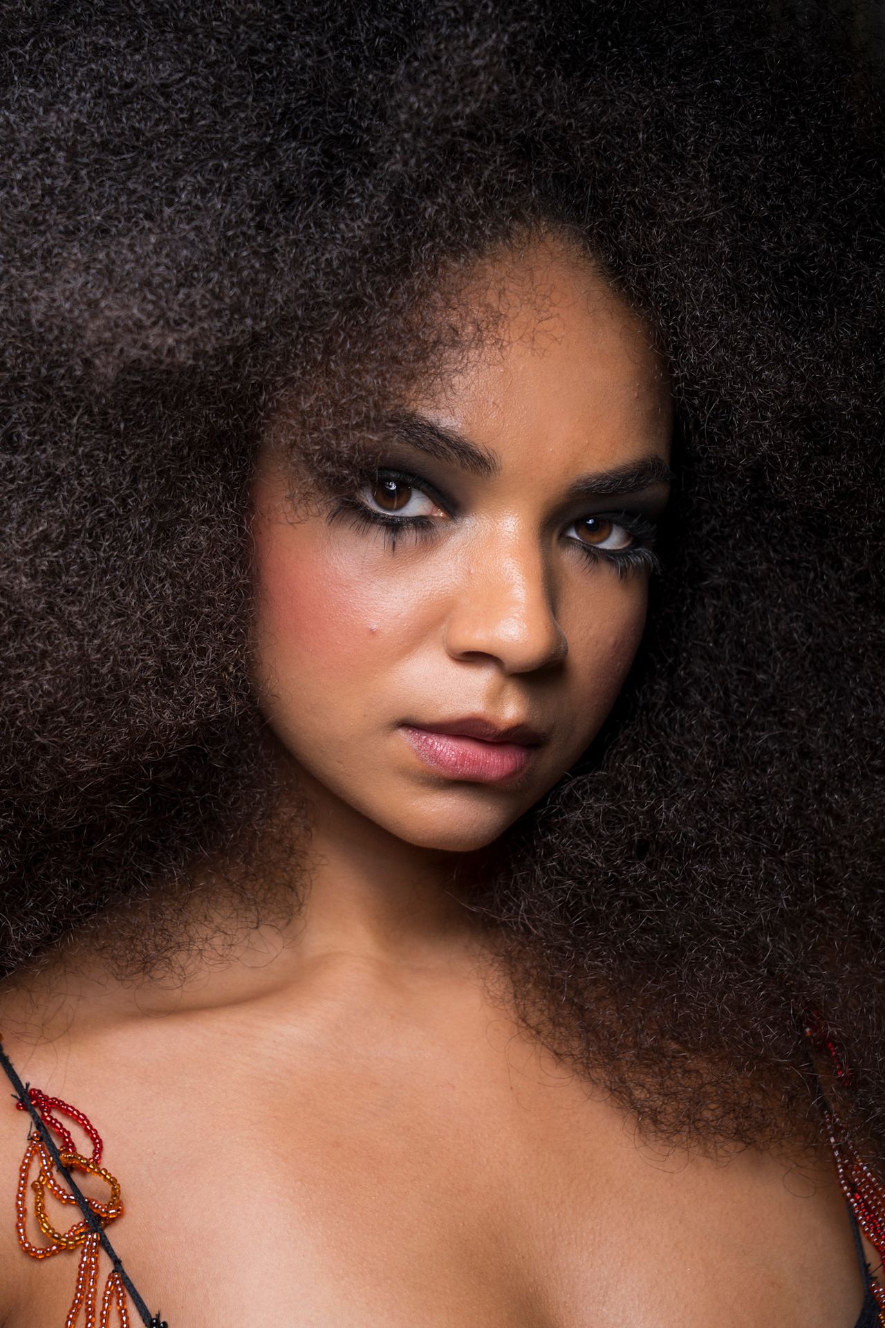 Various Women with deep, smokey eye makeup