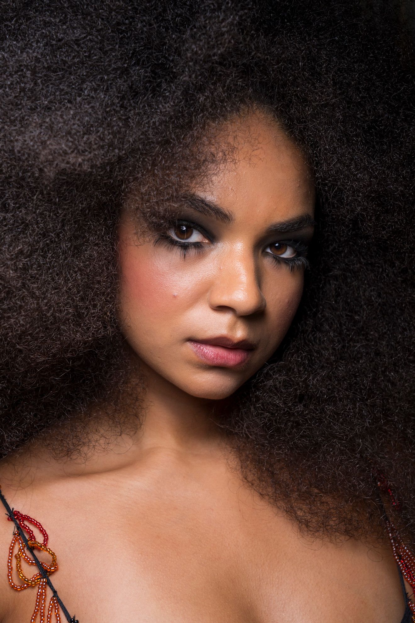 Various Women with deep, smokey eye makeup