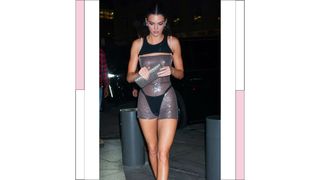 Kendall Jenner wears black underwear and a sheer, silver leotard while heading to a Met Gala afterparty on May 01, 2023 in New York City
