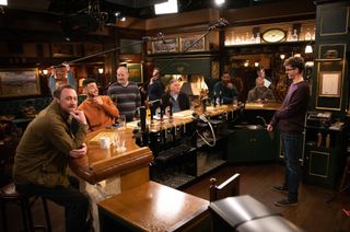 The men filming at the Woolpack in Emmerdale
