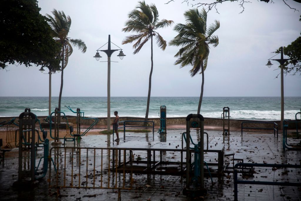 A man exercises in the rain in the Dominican Republic.