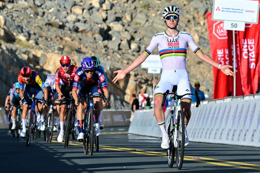 AE Team Emirates&#039; Slovenian rider Tadej Pogacar celebrates winning the third stage of the UAE Tour cycling race from Ras al Khaimah to Jebel Jais in the United Arab Emirates, on February 19, 2025. (Photo by Giuseppe CACACE / AFP)