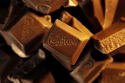 Close up of Cadbury's chocolate broken into individual squares